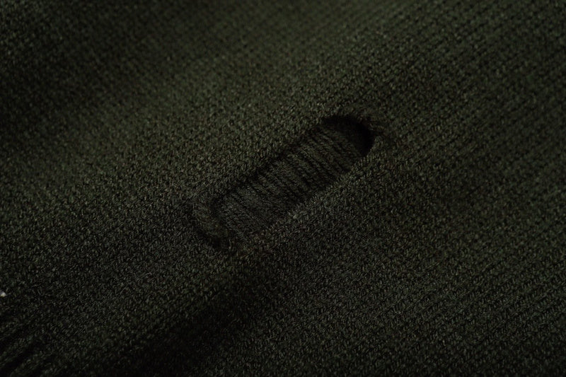 Side profile of Louis Vuitton luxury clothing with label-forward styling