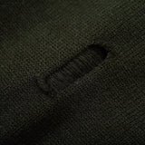 Side profile of Louis Vuitton luxury clothing with label-forward styling