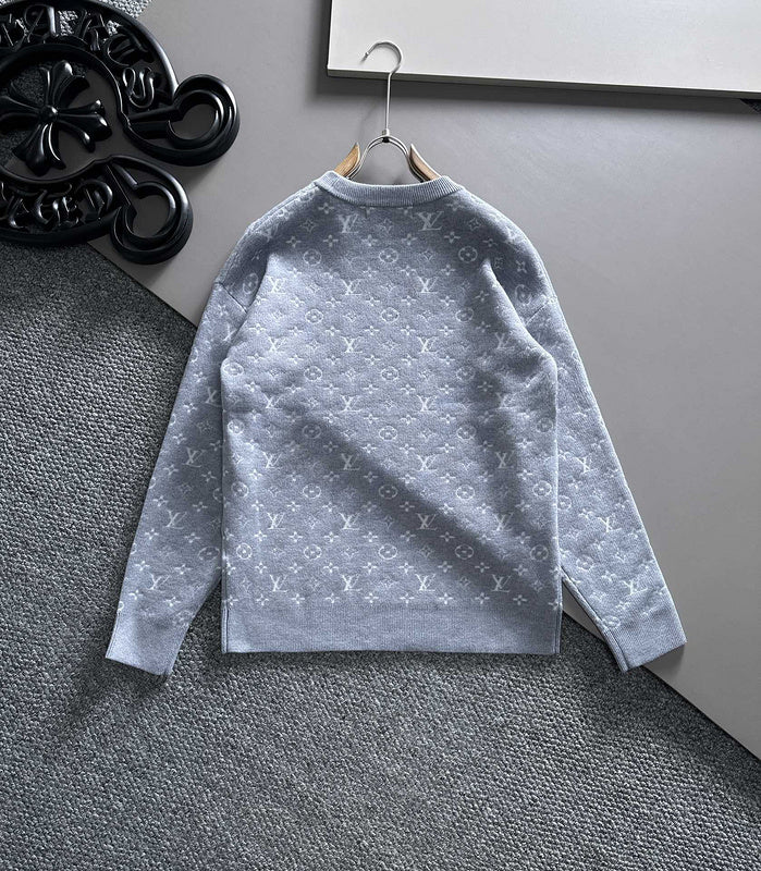 Close-up detail shot of Louis Vuitton luxury clothing with label-forward styling