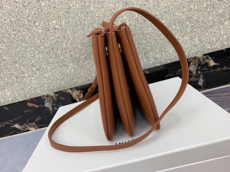 Side profile of premium signature women's handbag – women's premium purse
