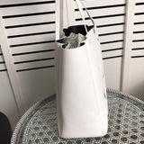 Handle and strap detail of sleek chic women's handbag – women's premium purse
