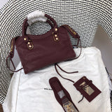 Close-up detail of everyday-luxe sleek women's handbag – women's statement bag
