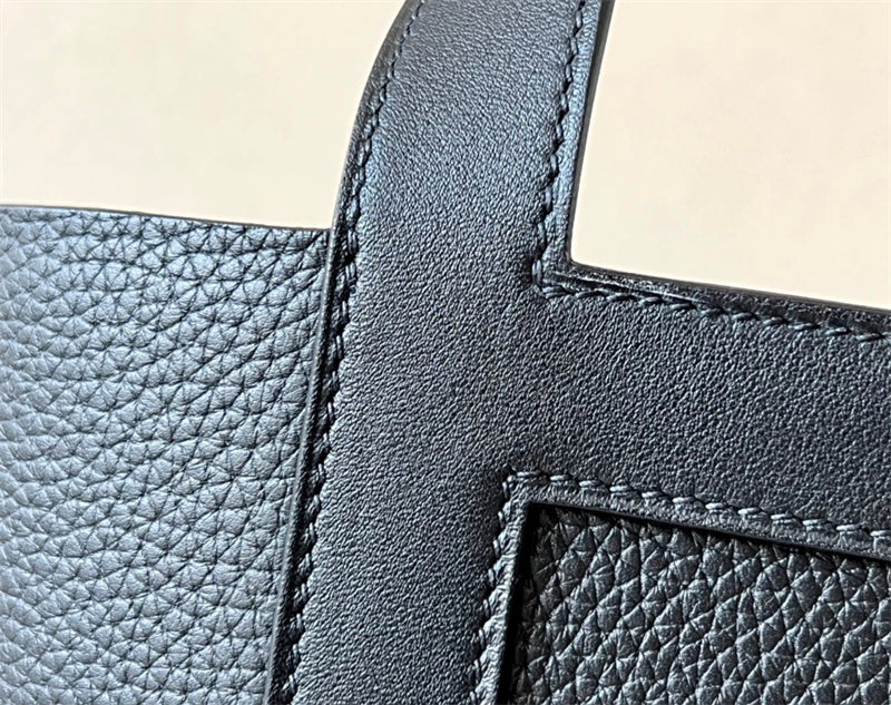 Side view of clean-lined structured handbag