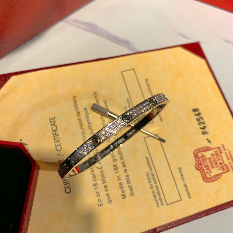 Front view of Cartier unisex jewelry piece