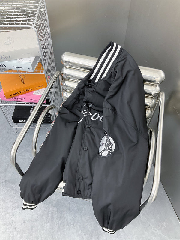 Close-up detail shot of Louis Vuitton luxury clothing with label-forward styling