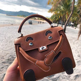 Side view of modern structured handbag