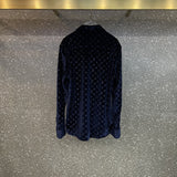 Close-up detail shot of Louis Vuitton luxury clothing with everyday silhouette