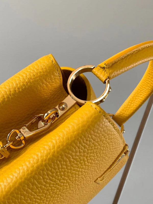Handle and strap detail of elevated chic women's handbag – women's luxury handbag