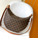  Statement crossbody bag carried on shoulder