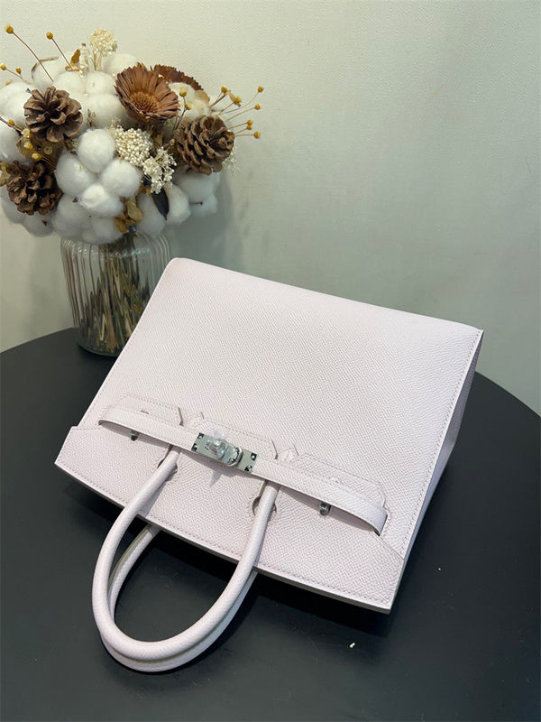 Side view of elegant structured handbag
