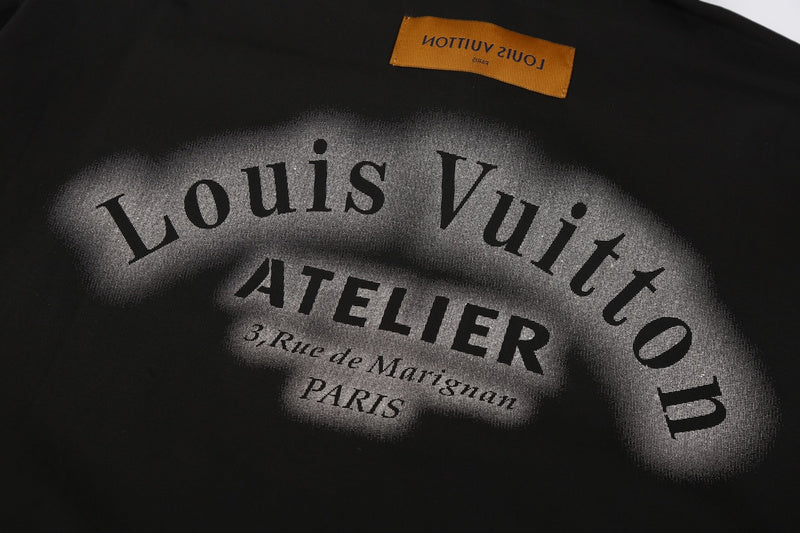 Close-up detail shot of Louis Vuitton luxury clothing with logo-detail design