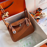  Refined handbag carried on shoulder