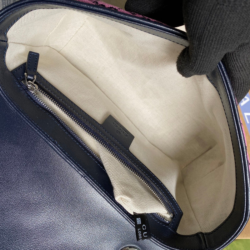 Side profile of structured refined women's handbag – women's statement bag