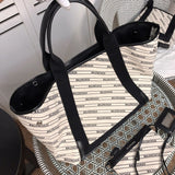 Back view of chic classic women's handbag – women's designer-style accessory