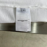 Close-up detail shot of Givenchy luxury clothing with contemporary cut