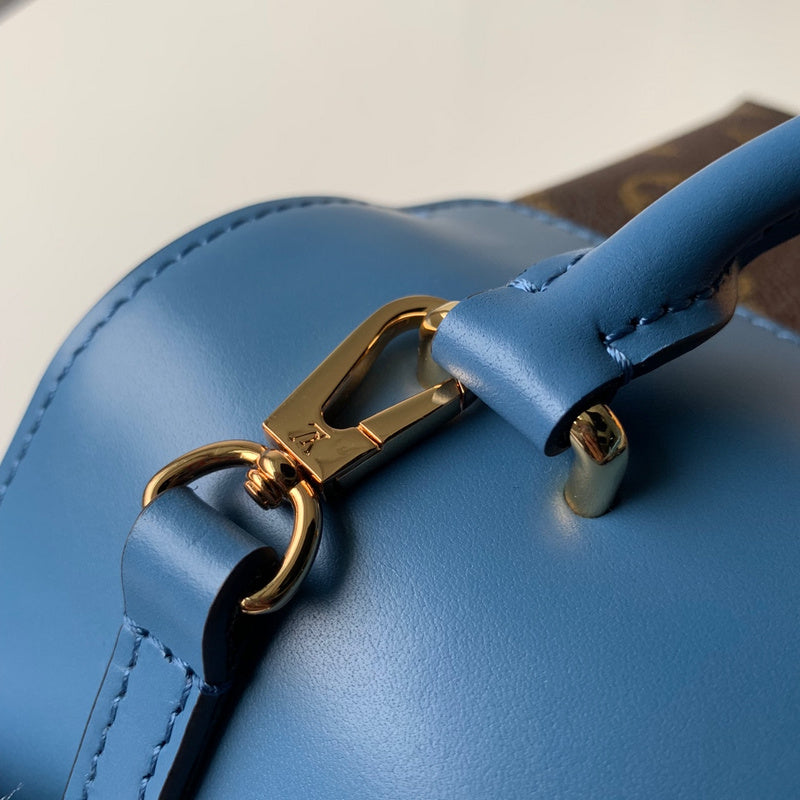 Close-up detail of sleek structured women's handbag – women's statement bag