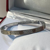 Close-up detail view of Cartier unisex jewelry piece