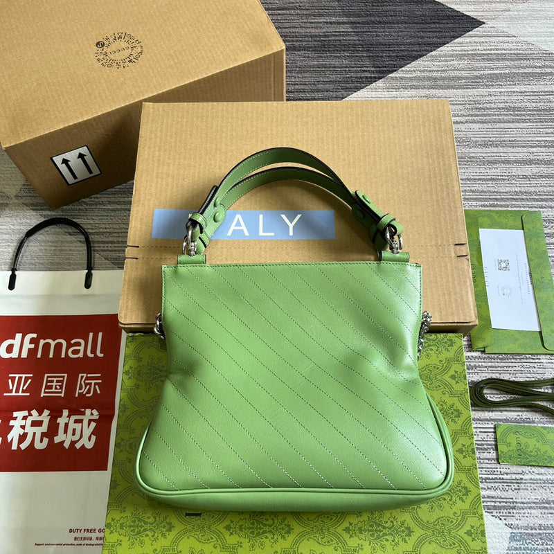 Front view of classic chic women's handbag – women's statement bag