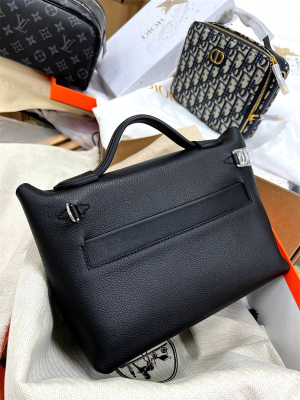 Side view of curated structured handbag