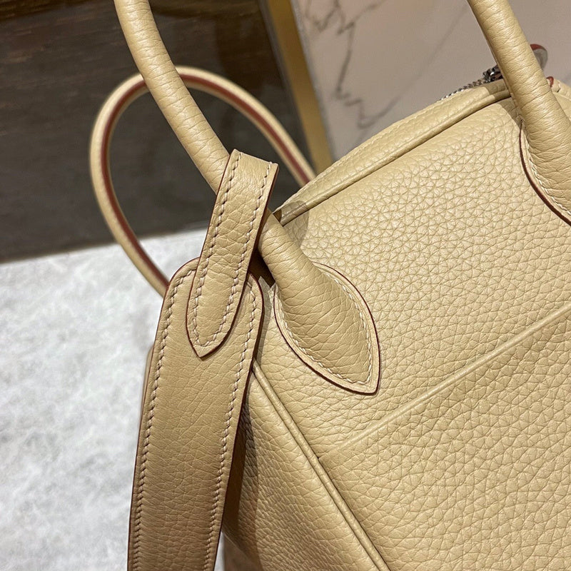Side view of polished structured handbag