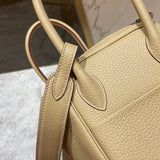 Side view of polished structured handbag