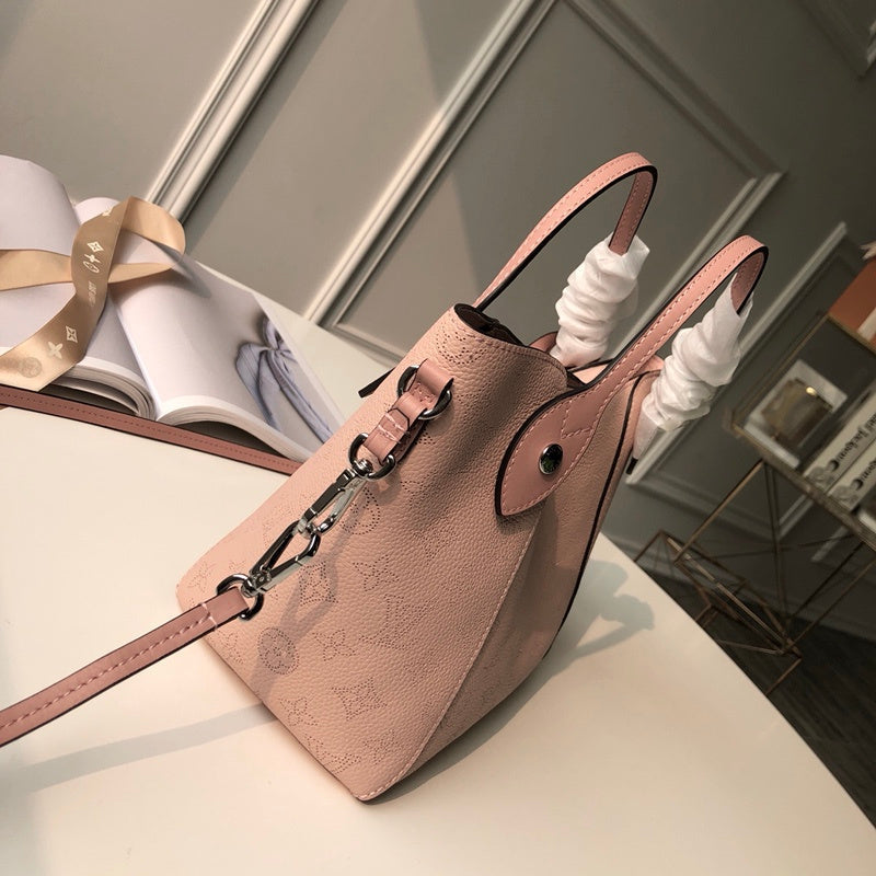 Styled lifestyle shot of elevated signature women's handbag – women's statement bag