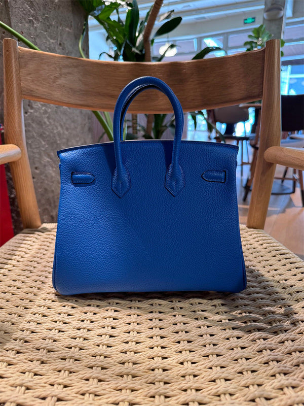 Side view of smart structured handbag