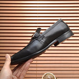 Hermes shoes Style 066 - close-up of statement logo accent