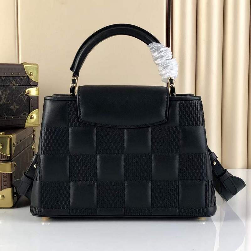 Styled lifestyle shot of classic everyday-luxe women's handbag – women's statement bag