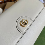 Handle and strap detail of everyday-luxe modern women's handbag – women's luxury accessory