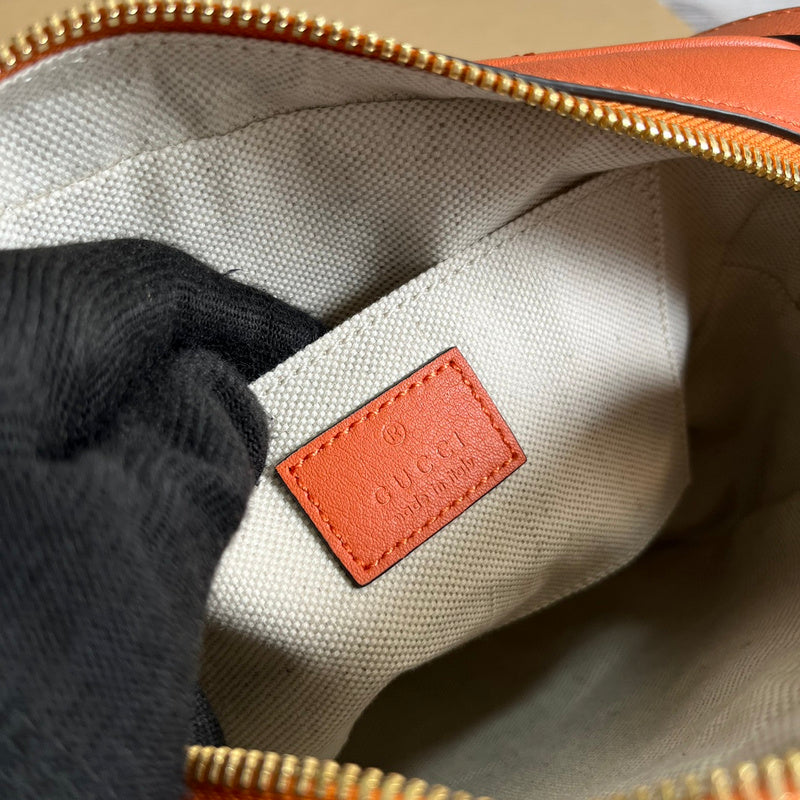 Close-up detail of signature premium women's handbag – women's luxury accessory