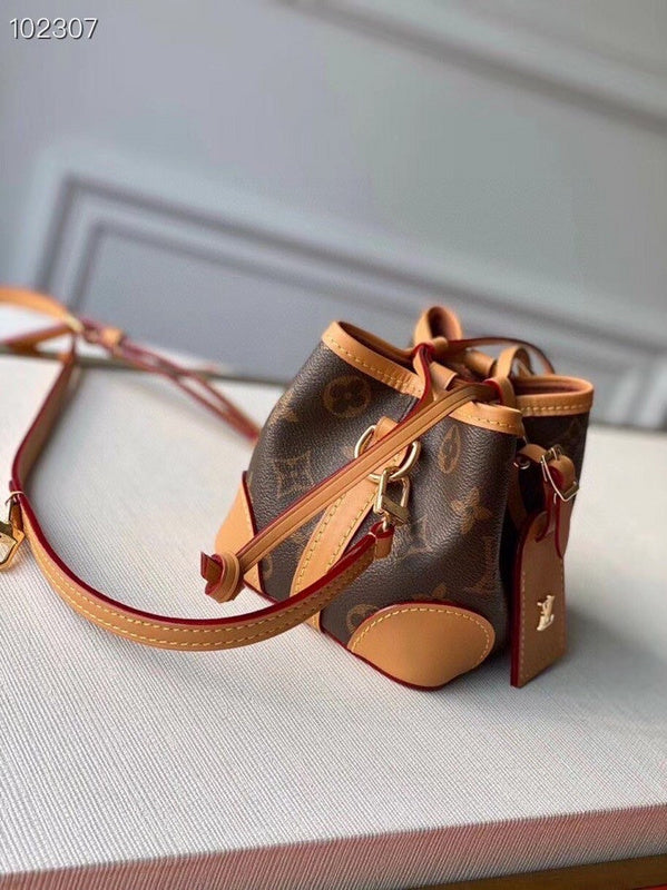 Handle and strap detail of polished modern women's handbag – women's everyday handbag