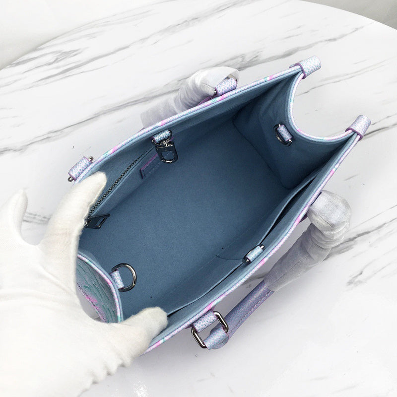 Back view of signature everyday-luxe women's handbag – women's statement bag