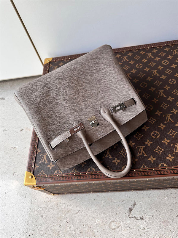  Statement shoulder bag carried on shoulder 22