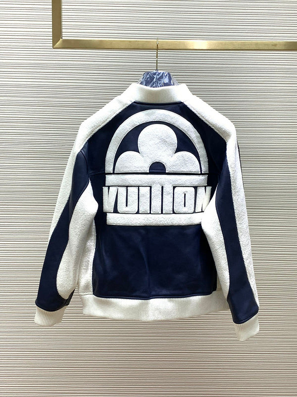 Close-up detail shot of Louis Vuitton luxury clothing with label-forward styling
