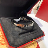 Angled view of Cartier unisex jewelry piece