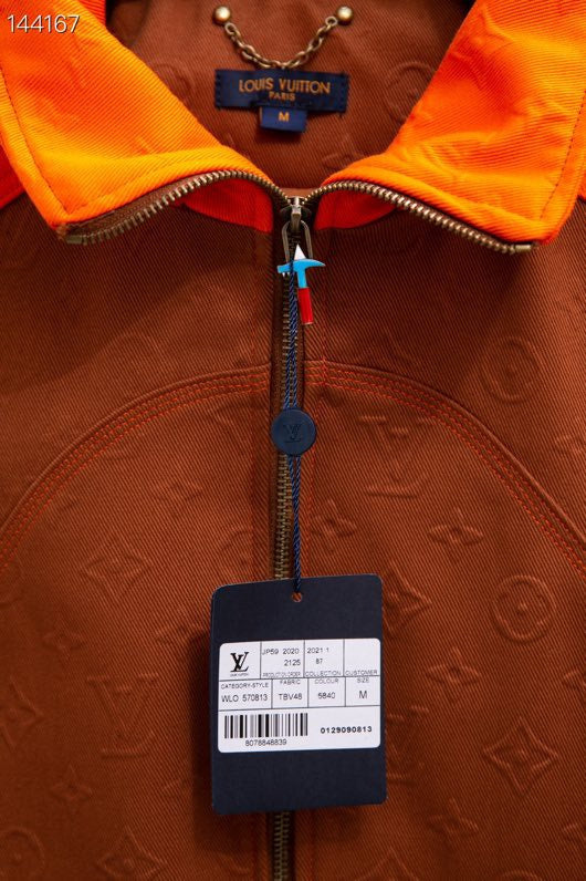 Flat lay presentation of Louis Vuitton luxury clothing with streetwear-inspired cut