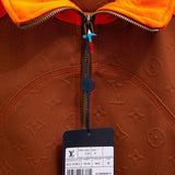 Flat lay presentation of Louis Vuitton luxury clothing with streetwear-inspired cut