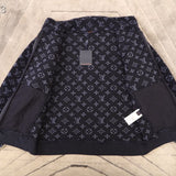 Side profile of Louis Vuitton luxury clothing with tailored silhouette