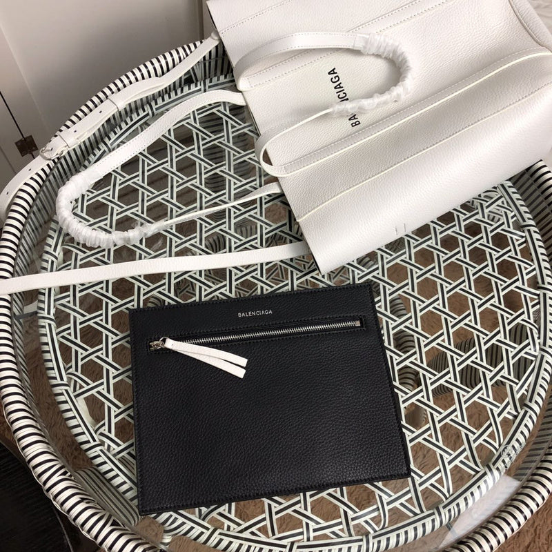 Side profile of structured elevated women's handbag – women's designer-style accessory