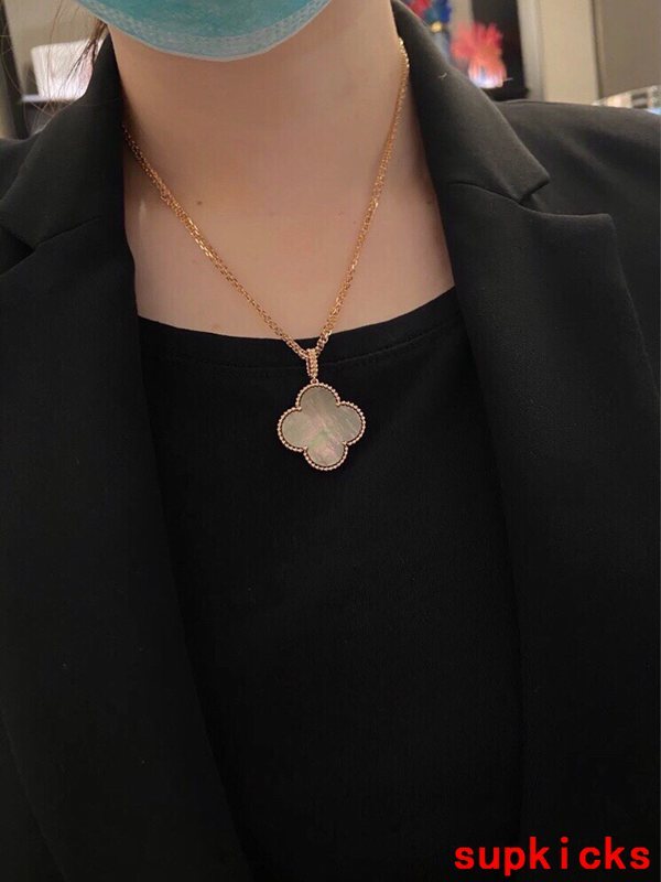 Lifestyle view of Van Cleef & Arpels unisex jewelry piece