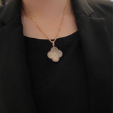 Lifestyle view of Van Cleef & Arpels unisex jewelry piece
