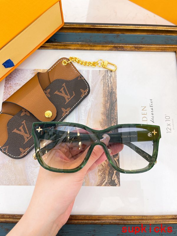 Close-up detail view of Louis Vuitton unisex sunglasses
