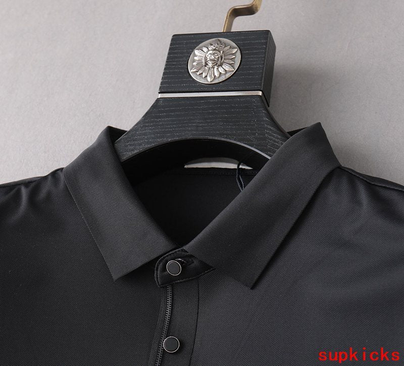 Flat lay presentation of Moncler luxury clothing with contemporary cut