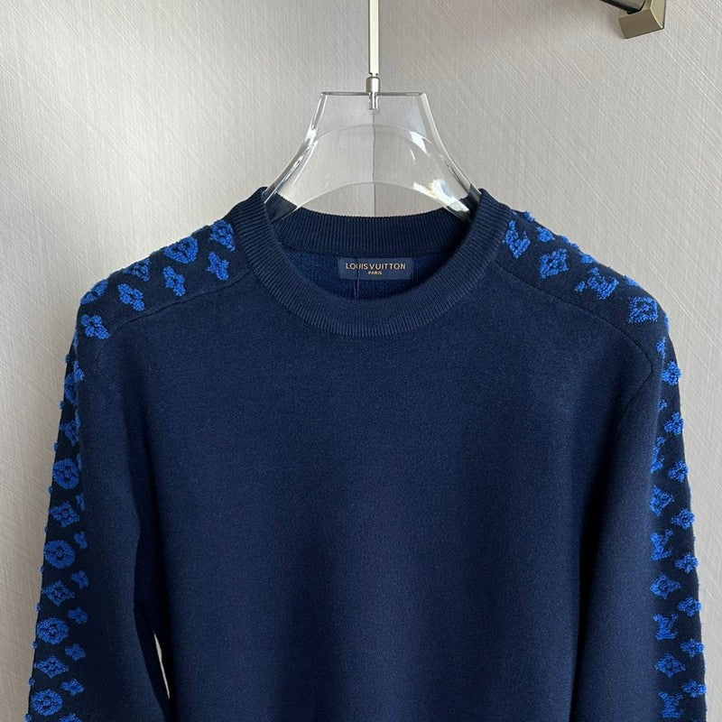 Close-up detail shot of Louis Vuitton luxury clothing with contemporary cut
