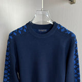 Close-up detail shot of Louis Vuitton luxury clothing with contemporary cut