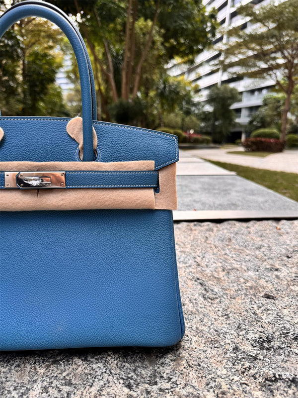 Side view of modern structured handbag