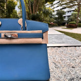 Side view of modern structured handbag