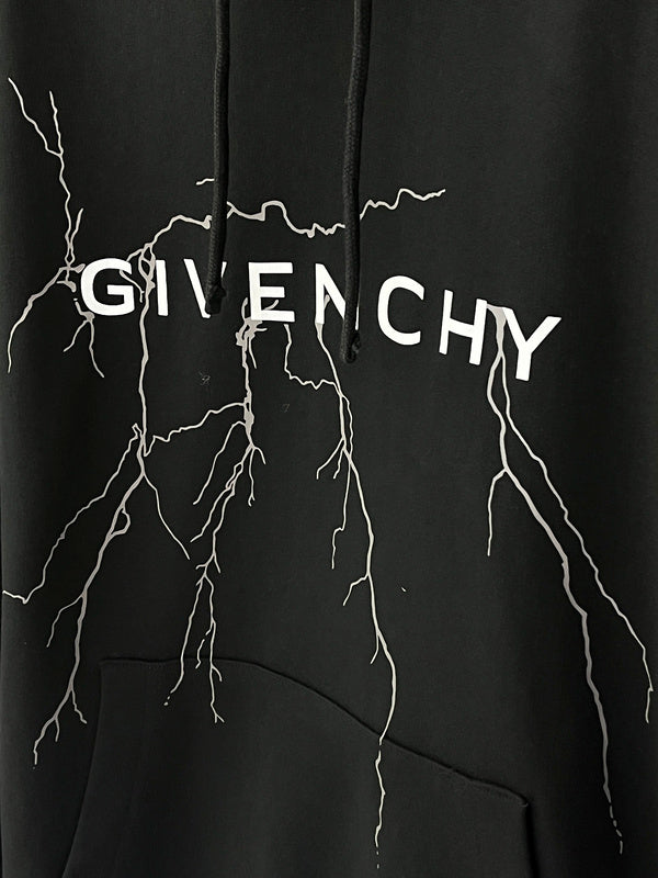 Flat lay presentation of Givenchy luxury clothing with everyday silhouette