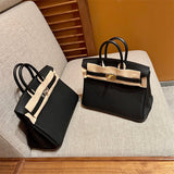  Understated satchel carried on shoulder 10